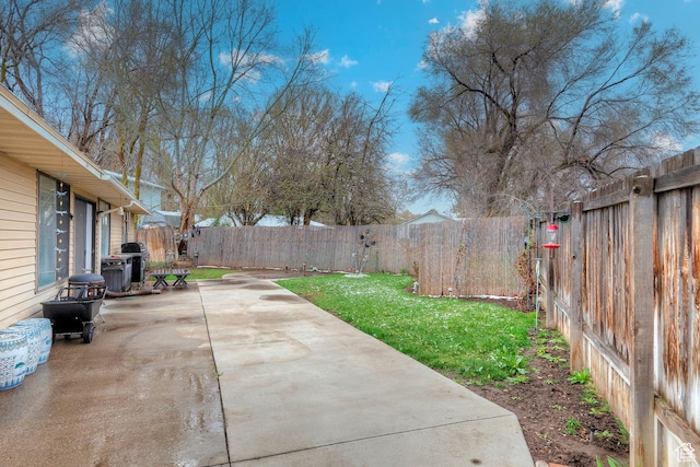 1077 E Deerwalk Ln S, Ogden, UT 84404 - view of yard with a fenced backyard and a patio area