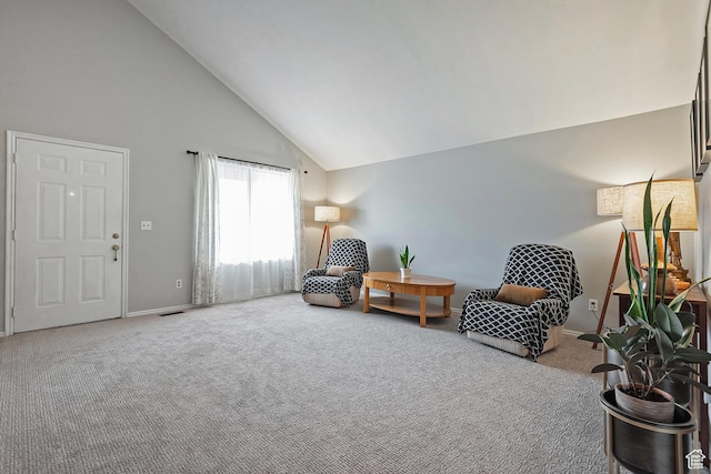 1077 E Deerwalk Ln S, Ogden, UT 84404 - living area featuring baseboards, high vaulted ceiling, and carpet floors
