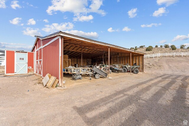 6832 W 1500 N, Cedar City, UT 84721 - view of pole building with fence and a detached carport