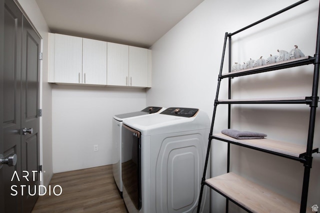 76 E 450 N, Ephraim, UT 84627 - laundry area featuring independent washer and dryer, cabinet space, and wood finished floors