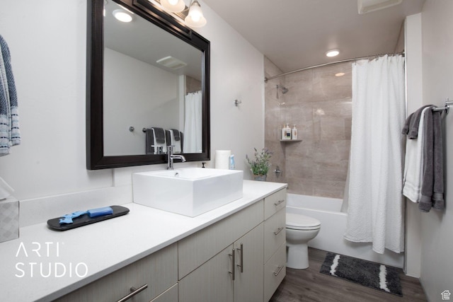 76 E 450 N, Ephraim, UT 84627 - full bathroom featuring vanity, toilet, visible vents, shower / bath combination with curtain, and wood finished floors