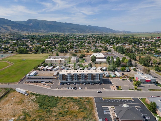 drone / aerial view featuring a mountain view