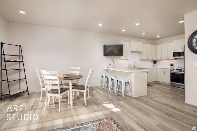 76 E 450 N, Ephraim, UT 84627 - dining space featuring recessed lighting and light wood-style floors