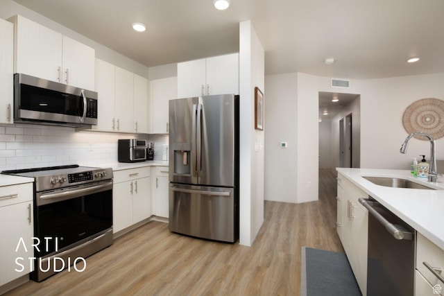 76 E 450 N, Ephraim, UT 84627 - kitchen featuring light countertops, a sink, stainless steel appliances, and visible vents