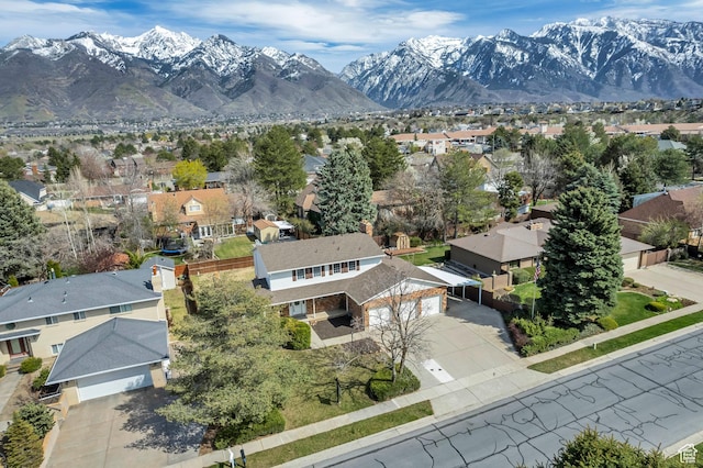 bird's eye view with a residential view and a mountain view