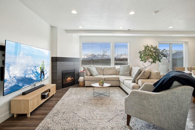 1960 W Jaydin Way S Unit 1, West Haven, UT 84401 - living area with recessed lighting, dark wood-style flooring, a textured ceiling, visible vents, and a fireplace