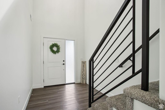 1960 W Jaydin Way S Unit 1, West Haven, UT 84401 - foyer entrance featuring dark wood finished floors, baseboards, a high ceiling, and stairway