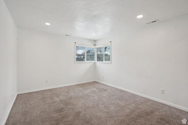 148 N Center St, Midway, UT 84049 - unfurnished room with baseboards, carpet floors, visible vents, and recessed lighting