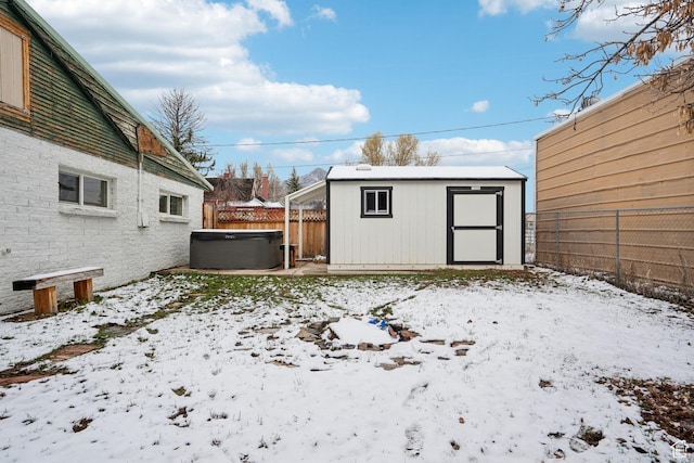 148 N Center St, Midway, UT 84049 - exterior space featuring a fenced backyard, an outbuilding, a storage unit, and a hot tub