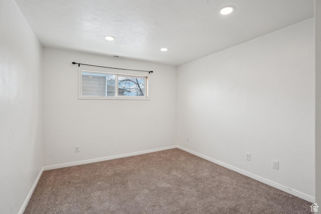 148 N Center St, Midway, UT 84049 - carpeted spare room featuring baseboards and recessed lighting