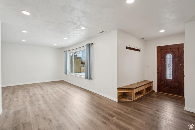 148 N Center St, Midway, UT 84049 - entrance foyer featuring baseboards, visible vents, recessed lighting, and wood finished floors