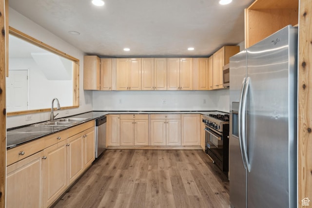 148 N Center St, Midway, UT 84049 - kitchen with a sink, light brown cabinetry, and appliances with stainless steel finishes