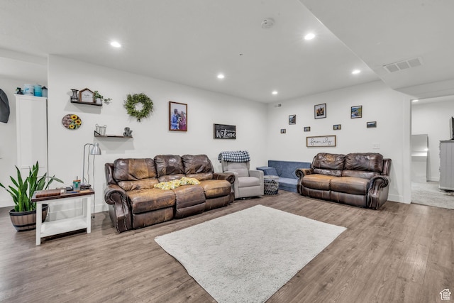 16132 S Coupler Ln Unit 406, Bluffdale, UT 84065 - living room featuring visible vents, wood finished floors, and recessed lighting
