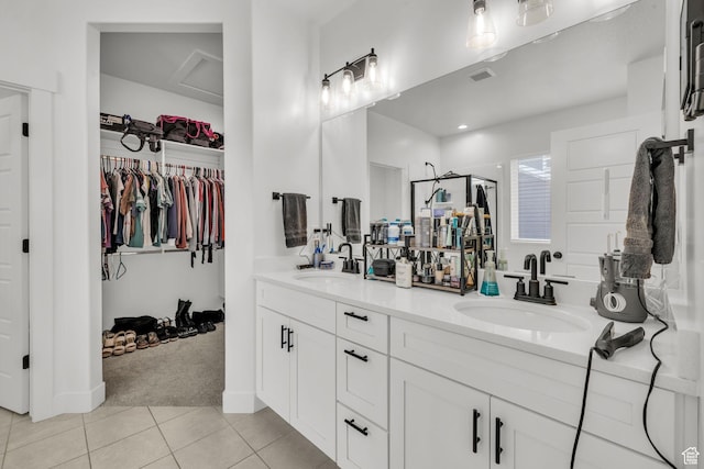 16132 S Coupler Ln Unit 406, Bluffdale, UT 84065 - bathroom featuring a stall shower, tile patterned floors, double vanity, and a sink