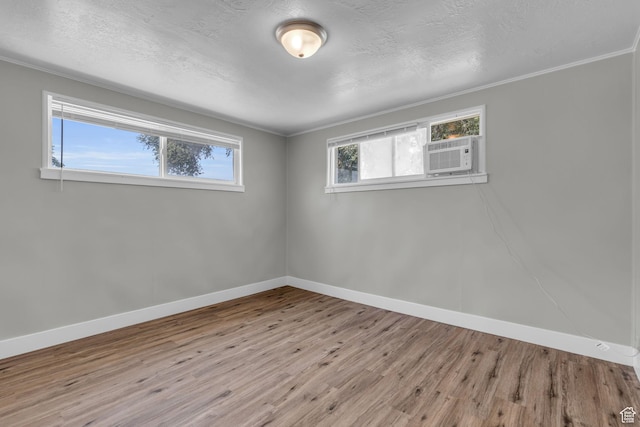 2620 S 8590 W, Magna, UT 84044 - empty room featuring baseboards, wood finished floors, and plenty of natural light