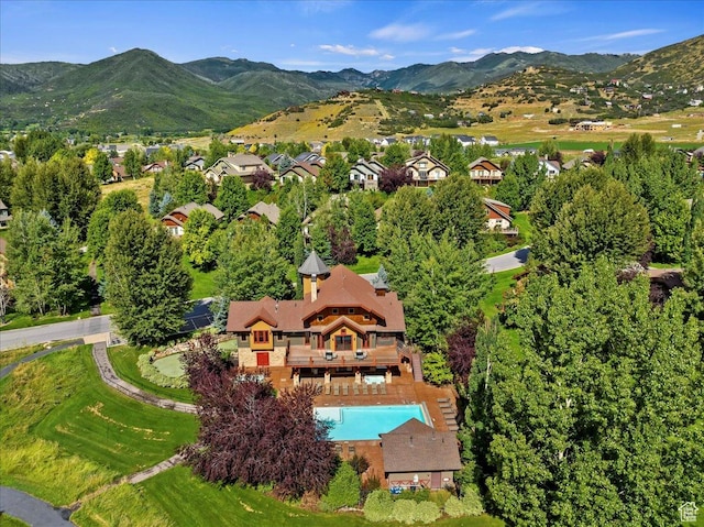 drone / aerial view featuring a mountain view