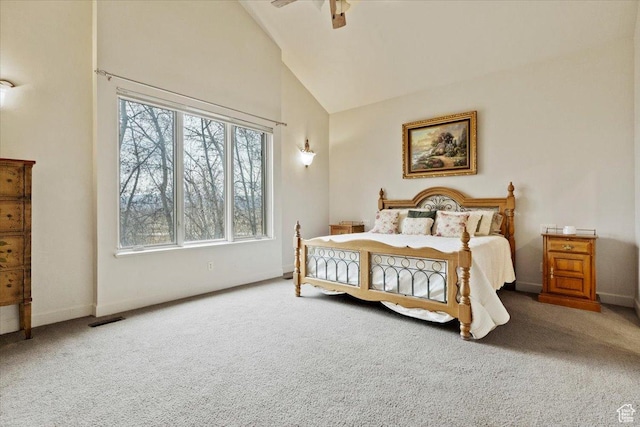 carpeted bedroom with baseboards, high vaulted ceiling, visible vents, and ceiling fan
