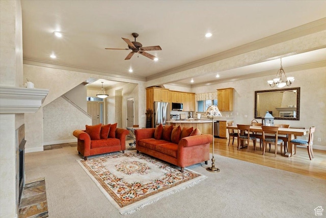 living area featuring baseboards, a fireplace, ceiling fan, and recessed lighting