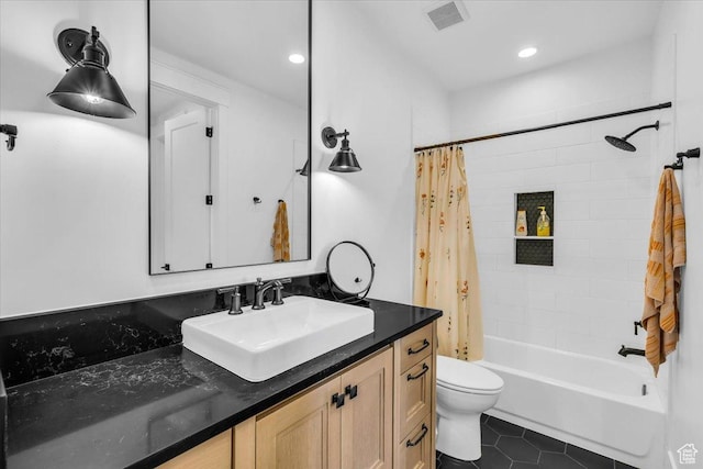 697 E Margarita Way, Washington, UT 84780 - bathroom featuring toilet, vanity, shower / bath combo, tile patterned flooring, and visible vents