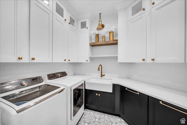 697 E Margarita Way, Washington, UT 84780 - laundry room with independent washer and dryer, cabinet space, and a sink
