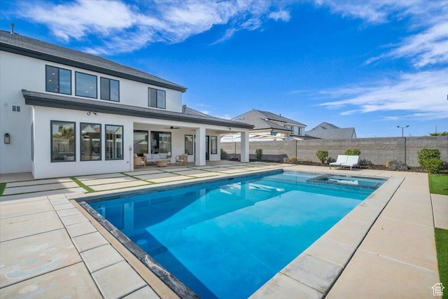 697 E Margarita Way, Washington, UT 84780 - view of pool featuring a pool with connected hot tub, a patio area, a fenced backyard, an outdoor hangout area, and ceiling fan