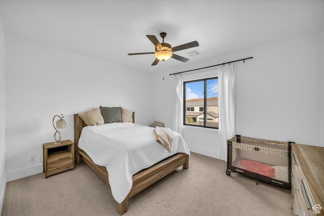 697 E Margarita Way, Washington, UT 84780 - bedroom with baseboards, visible vents, a ceiling fan, and light colored carpet