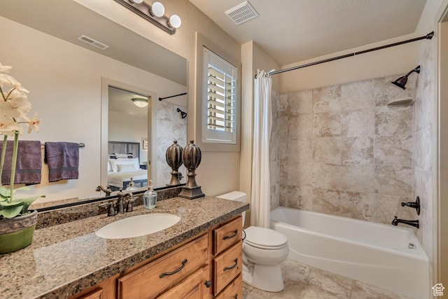 ensuite bathroom featuring toilet, shower / bathtub combination with curtain, vanity, and visible vents