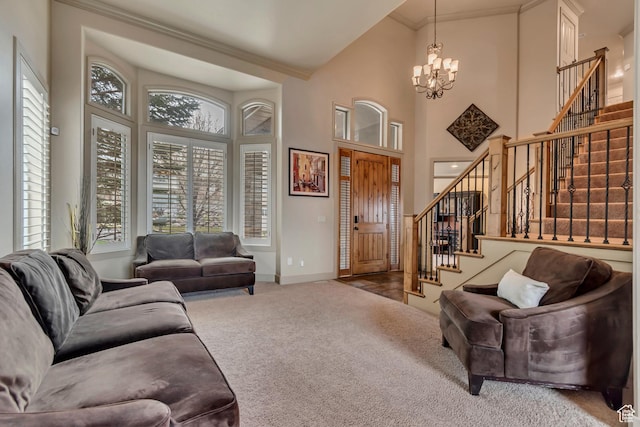 living room featuring carpet, baseboards, stairway, a high ceiling, and an inviting chandelier