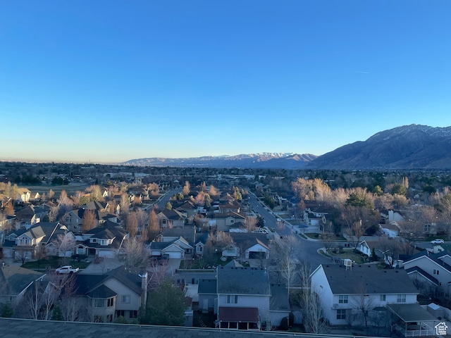 property's view of city featuring a residential view and a mountain view
