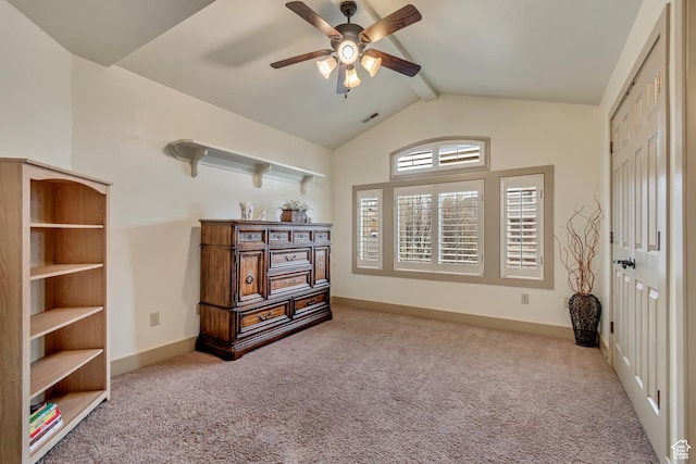 carpeted bedroom featuring baseboards, lofted ceiling with beams, visible vents, and ceiling fan