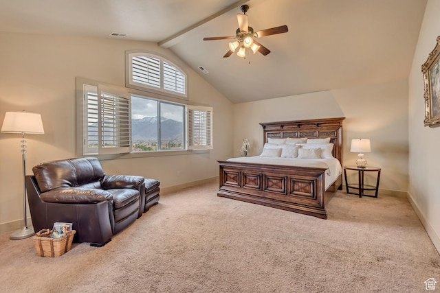 carpeted bedroom featuring lofted ceiling with beams, visible vents, baseboards, ceiling fan, and a mountain view