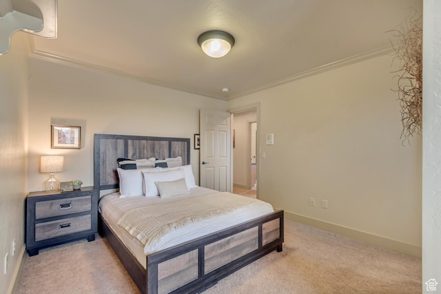 bedroom featuring ornamental molding, light carpet, and baseboards