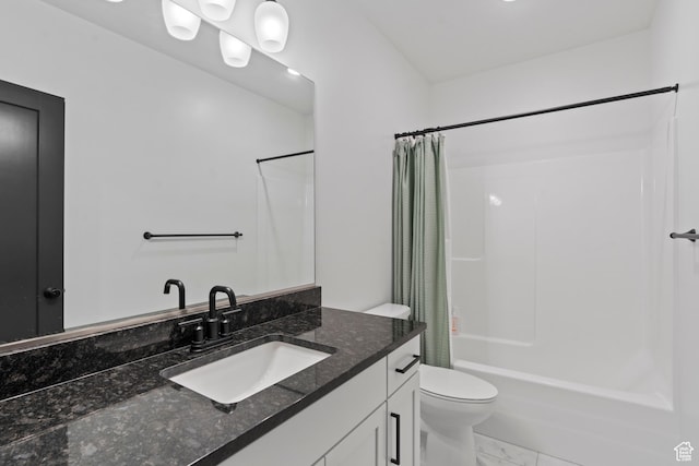 full bath with marble finish floor, shower / bathtub combination with curtain, toilet, and vanity