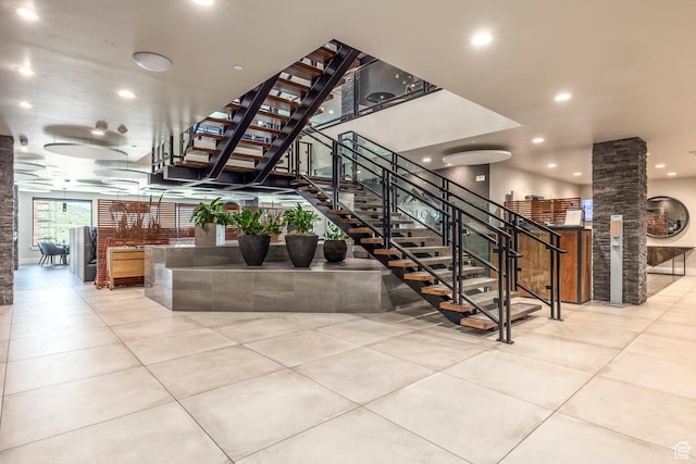909 W Peace Tree Trl Unit 206, Kamas, UT 84036 - stairs featuring tile patterned floors, recessed lighting, and ornate columns