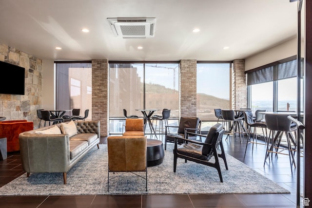 909 W Peace Tree Trl Unit 206, Kamas, UT 84036 - living area featuring a mountain view and recessed lighting