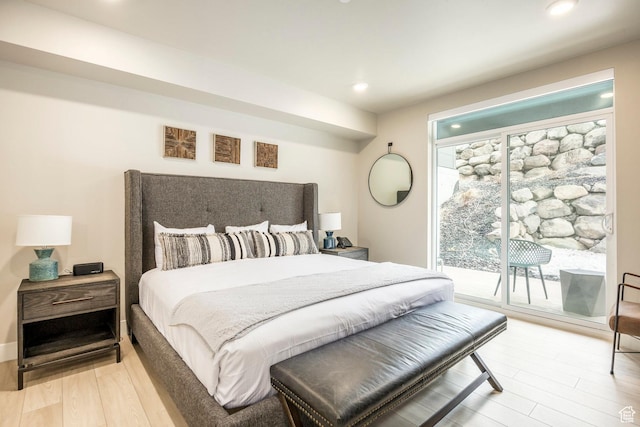 909 W Peace Tree Trl Unit 206, Kamas, UT 84036 - bedroom featuring light wood finished floors, access to exterior, and recessed lighting