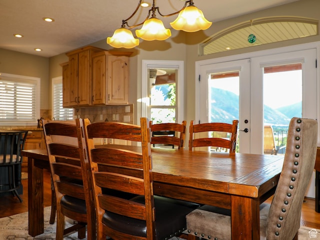 2524 E 700 S, Springville, UT 84663 - dining room featuring light wood-style floors, a healthy amount of sunlight, a chandelier, and recessed lighting