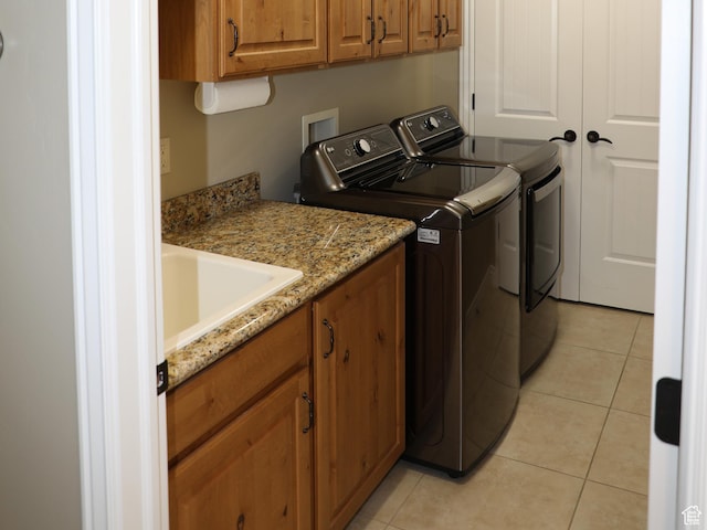 2524 E 700 S, Springville, UT 84663 - washroom with washing machine and clothes dryer, cabinet space, a sink, and light tile patterned floors
