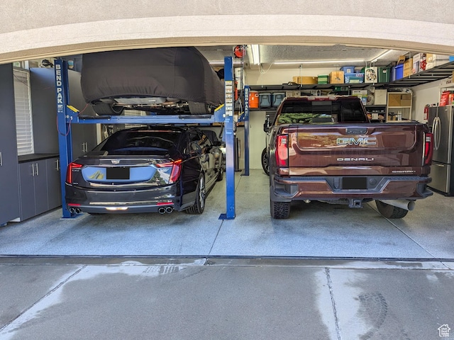2524 E 700 S, Springville, UT 84663 - garage featuring freestanding refrigerator