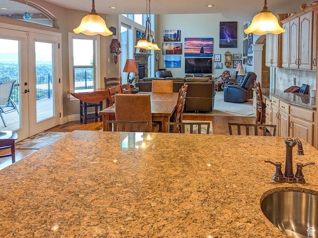 2524 E 700 S, Springville, UT 84663 - kitchen with light stone counters, a sink, tasteful backsplash, decorative light fixtures, and recessed lighting
