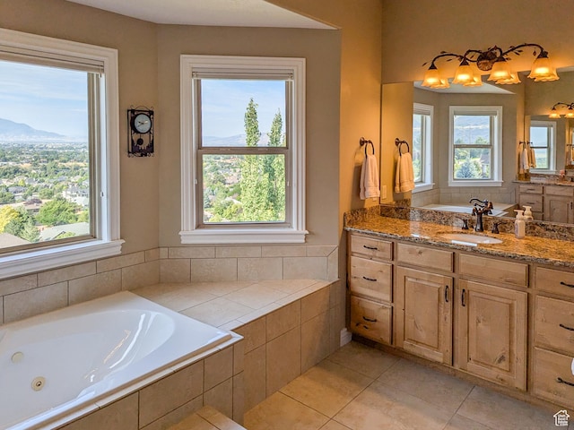 2524 E 700 S, Springville, UT 84663 - full bathroom featuring vanity, a healthy amount of sunlight, tile patterned floors, and a whirlpool tub