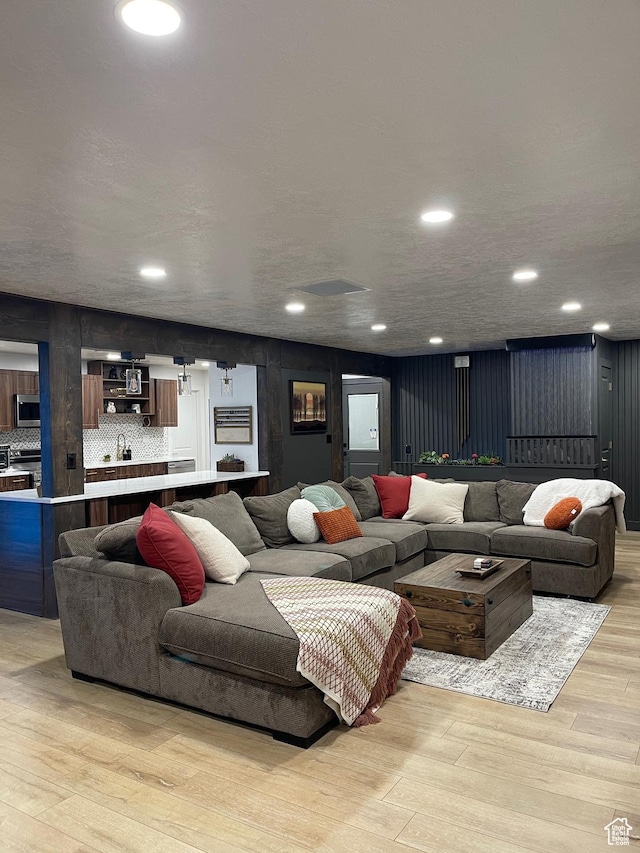 3444 S 1100 E, Millcreek, UT 84106 - living room featuring recessed lighting and light wood-type flooring