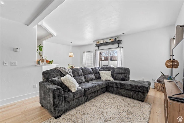 8464 S Ivy Springs Ln, West Jordan, UT 84081 - living room with baseboards and light wood-style floors