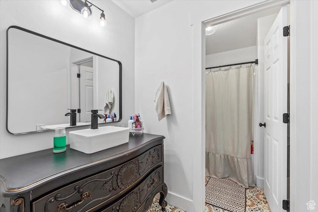 8464 S Ivy Springs Ln, West Jordan, UT 84081 - bathroom featuring baseboards, curtained shower, and vanity
