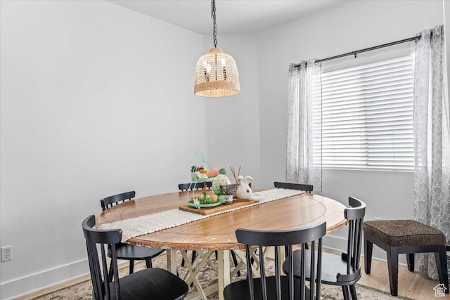 8464 S Ivy Springs Ln, West Jordan, UT 84081 - dining area featuring baseboards and wood finished floors
