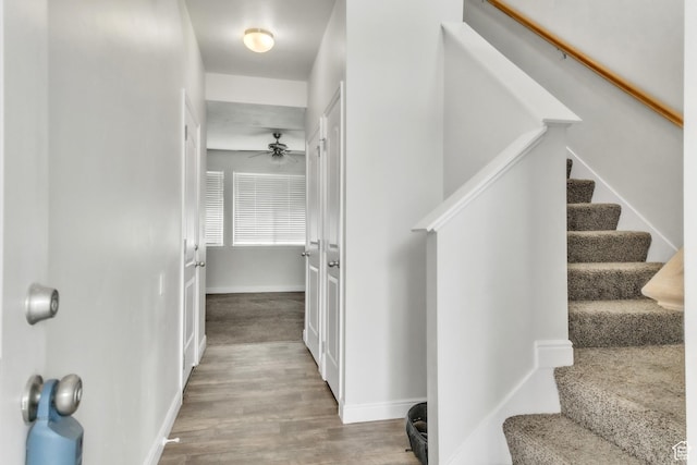 14292 S Autumn Path Ln W, Riverton, UT 84096 - interior space featuring stairs, baseboards, and wood finished floors