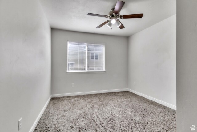 14292 S Autumn Path Ln W, Riverton, UT 84096 - spare room featuring carpet floors, ceiling fan, and baseboards