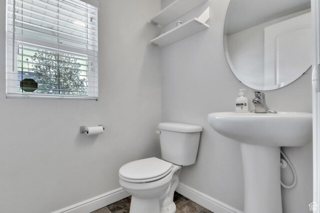 14292 S Autumn Path Ln W, Riverton, UT 84096 - bathroom with baseboards, a sink, and toilet