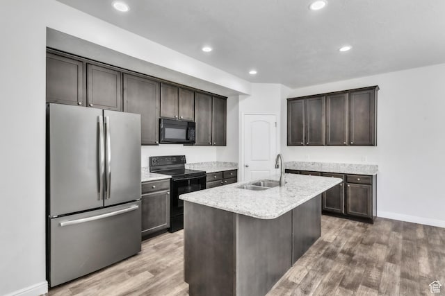 14292 S Autumn Path Ln W, Riverton, UT 84096 - kitchen featuring a sink, dark brown cabinetry, black appliances, and wood finished floors