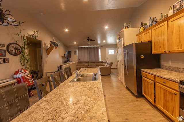 660 E 400 N, Spring City, UT 84662 - kitchen with open floor plan, stainless steel fridge, light wood-type flooring, a sink, and ceiling fan